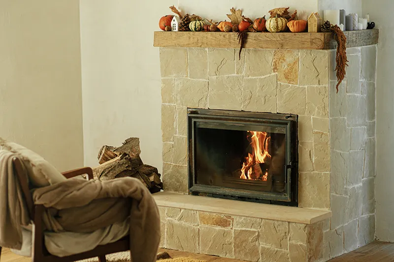 heating house with wood burning fireplace